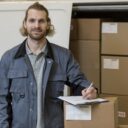 smiley-man-working-medium-shot